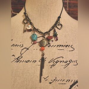 Mixed charm necklace.